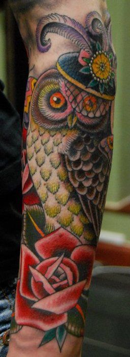 Pretty colorful owl tattoo