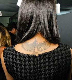 Pretty women's back Egypt style tattoo