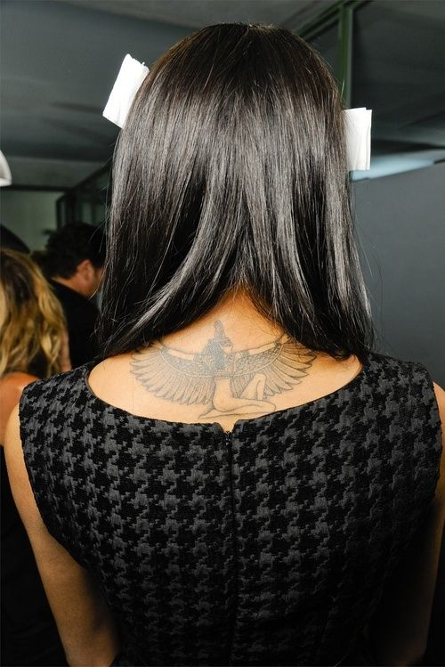 Pretty women’s back Egypt style tattoo