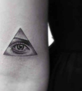 Realistic woman eye tattoo