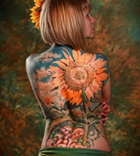 Realistic woman sunflower tattoo