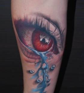 Red eye tattoo