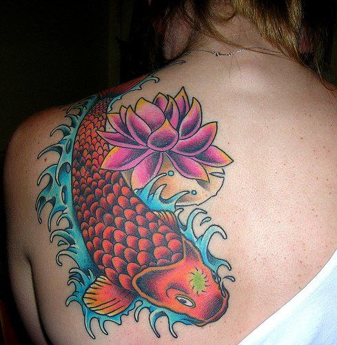 Red fish and lotus flower tattoo