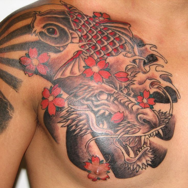 Red fish flowers and dragon tattoo