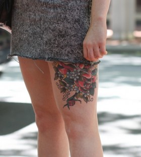 Red rose legs tattoo