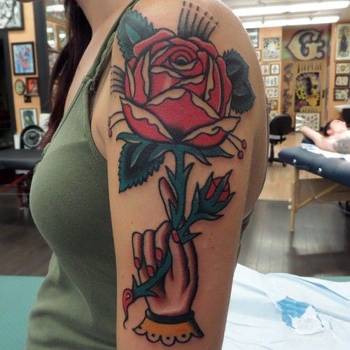 Red rose tattoo by Dustin Barnhart