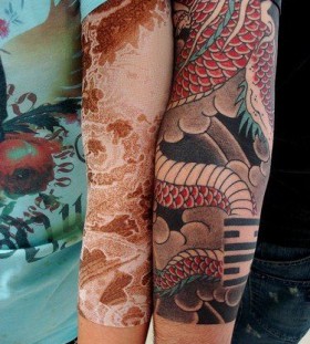 Red snake lace tattoo