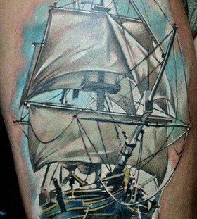 Simple blue ship tattoo