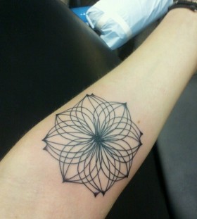 Simple hand lotus flower tattoo