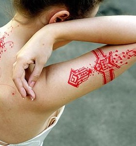 Simple woman red tattoo