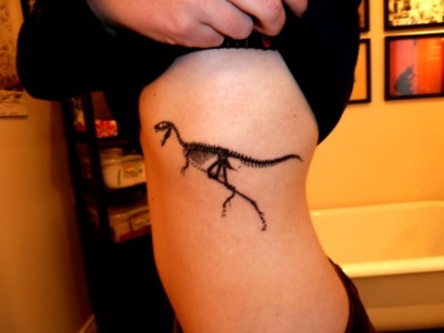 Skeleton of dinosaur tattoo