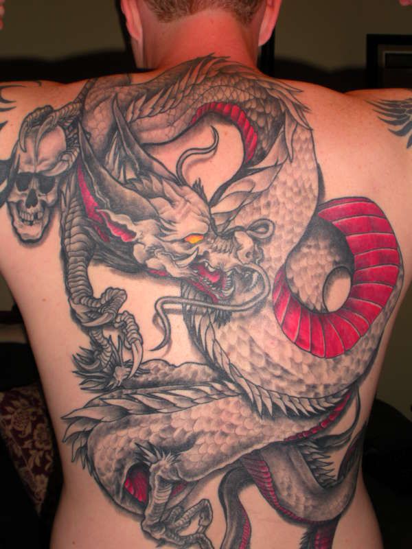 Skull and red dragon tattoo