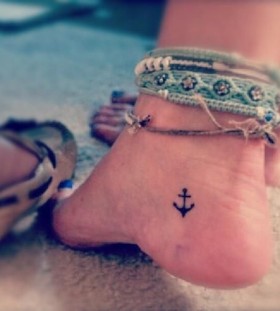 Small anchor girl tattoo
