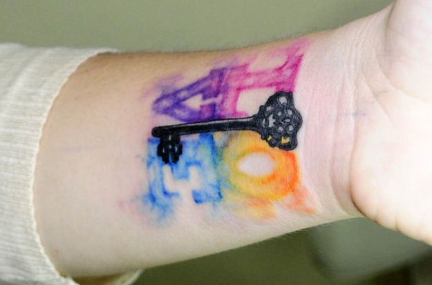 Watercolor key painting tattoo