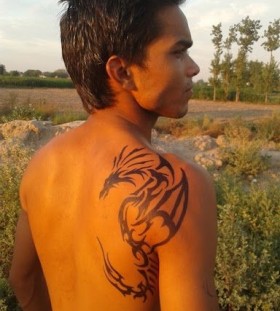 Weird man dragon tattoo