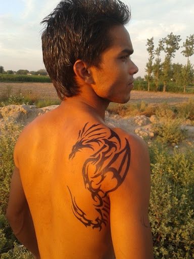 Weird man dragon tattoo