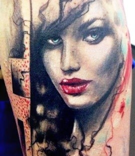 Woman with red lips tattoo by Adam Kremer