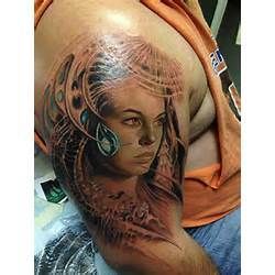 3D girl face tattoo on arm