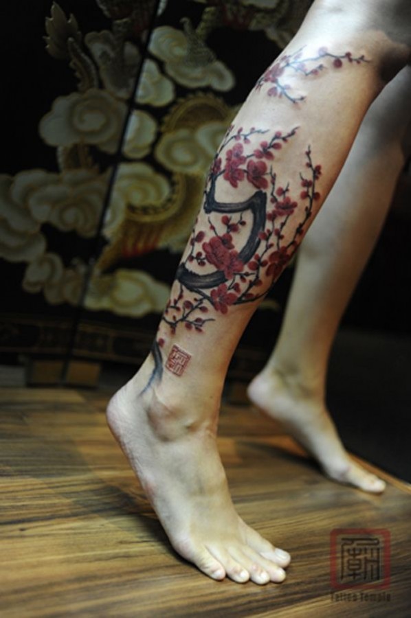 Adorable big tree tattoo on leg