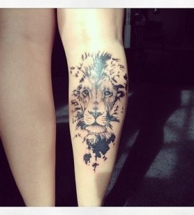 Adorable black lion tattoo on leg