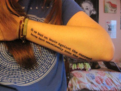 Adorable black quote tattoo on arm