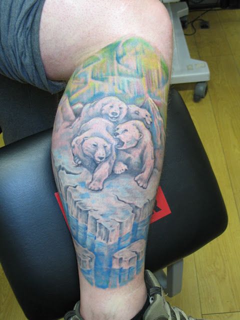 Adorable blue bear tattoo on leg