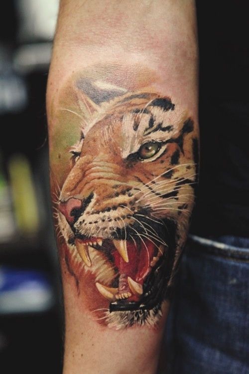 Adorable lovely tiger tattoo on arm