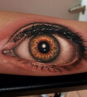 Adorable realistic eye tattoo on arm