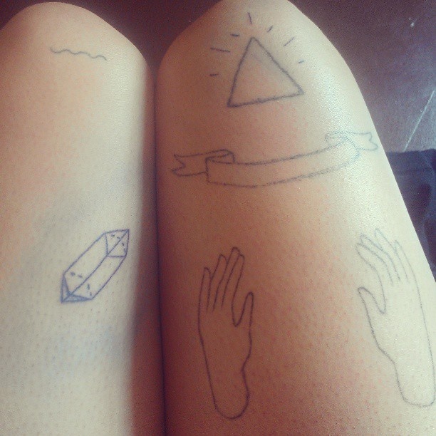 Adorable simple crystal tattoo on leg