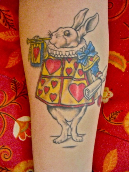 Adorable simple rabbit tattoo on arm