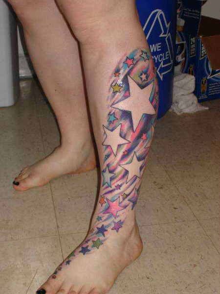 Adorable women star tattoo on leg