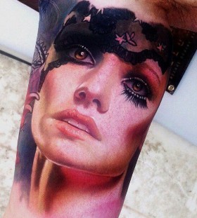 Adorable women's face tattoo on arm