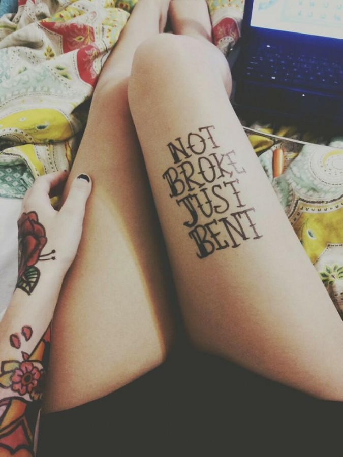 Adorable women’s quote tattoo on leg