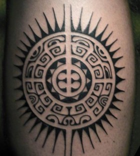 Amazing black sun tattoo on leg