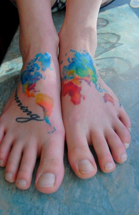 Amazing colorful map tattoo on legs