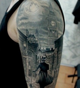 Amazing town view and moon tattoo on shoulder