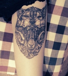 Amazing wierd wolf tattoo on leg