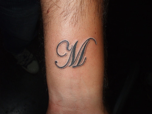 Awesome M letter tattoo