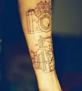 Awesome black camera tattoo on arm