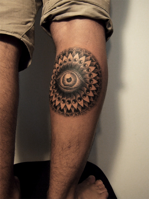 Awesome champ eye tattoo on leg