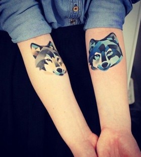 Awesome colors ornaments wolf tattoo on arm