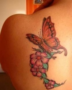 Awesome flower and butterfly tattoo on shoulder