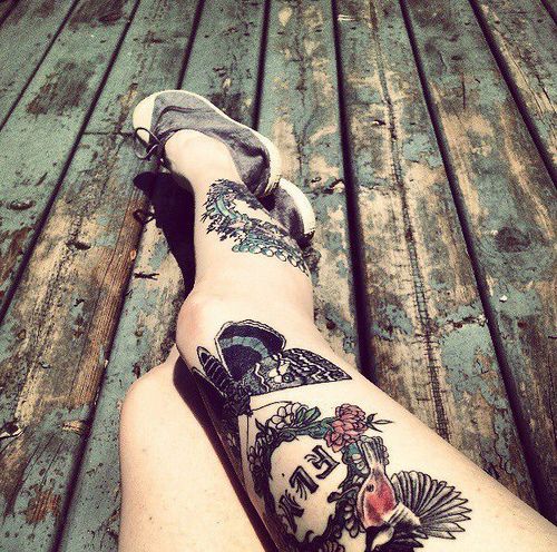 Awesome girl bird tattoo on leg