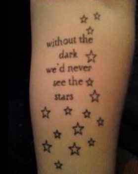 Awesome quite and star tattoo on arm