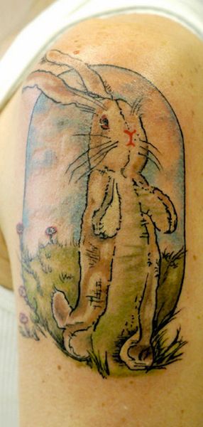 Awesome, simple rabbit tattoo on arm