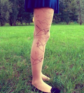 Awesome skirt and origami tattoo on leg