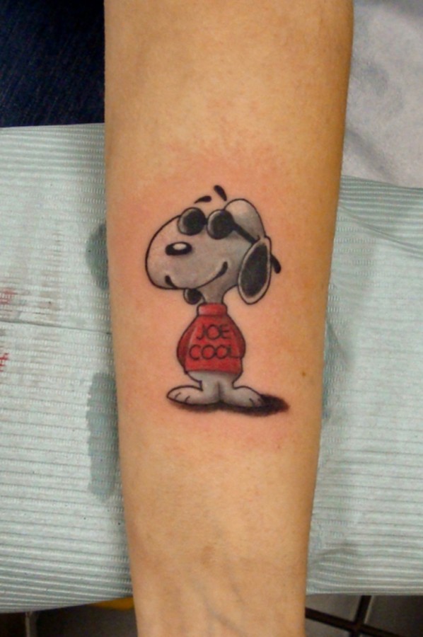 Awesome snoopy tattoo on arm