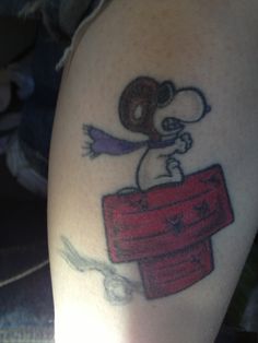 Awesome snoopy tattoo