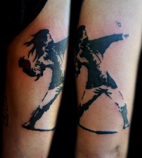 Bansky- girl with granade tattoo