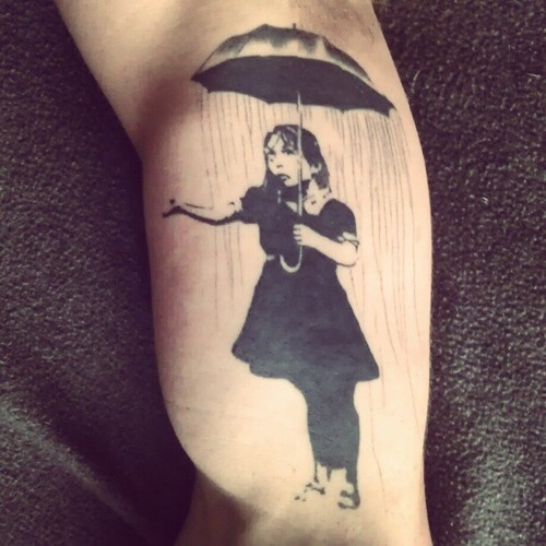 Bansky- girl with umbrella tattoo